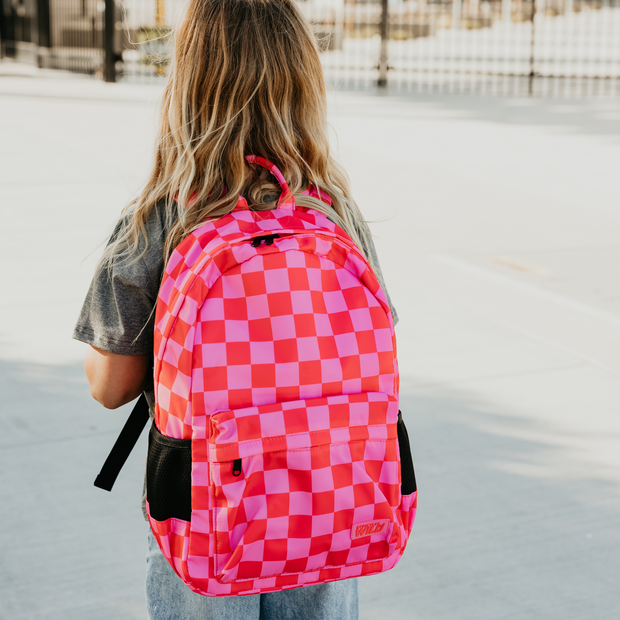 Speedy Pink Checker Backpacks