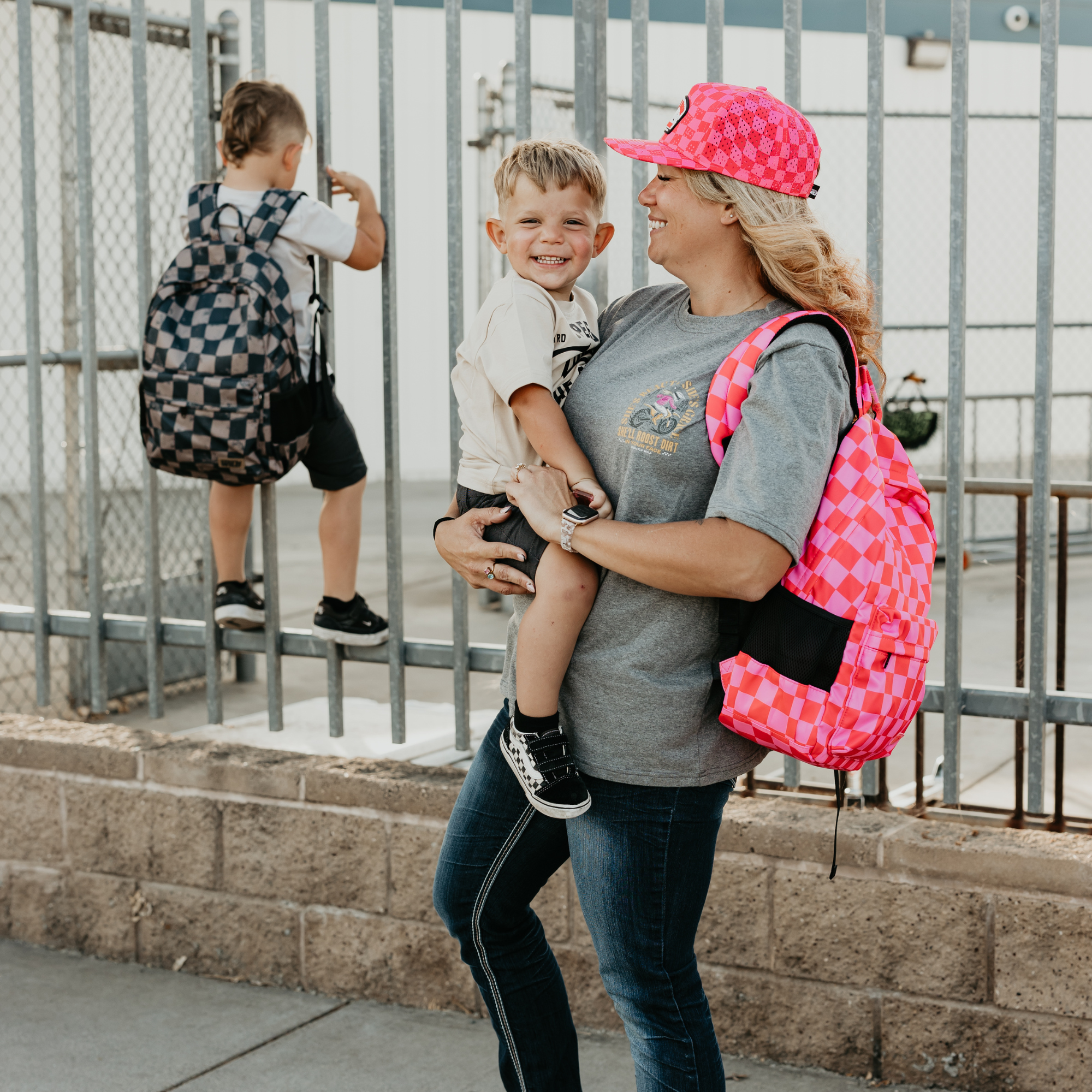 Speedy Pink Checker Backpacks